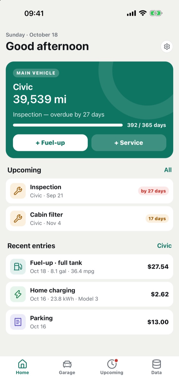 Home screen: main vehicle with mileage, upcoming services and recent entries